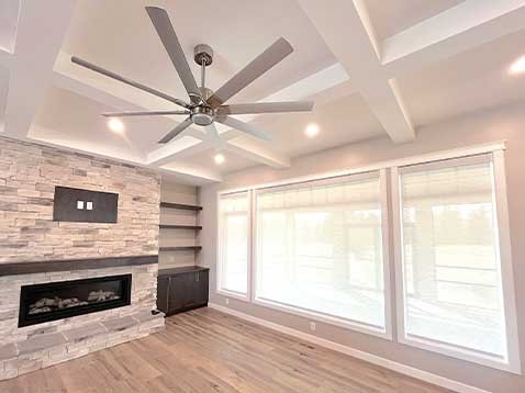 Living room showcasing hanging blinds